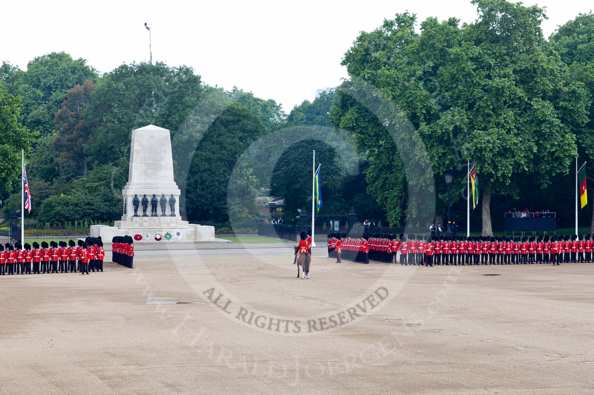 Trooping the Colour 2011: No. 3 Guard has opened a gap in the row of guards for the Royal Procession, in front of the Guards Memorial.
In the centre is the Field Officer, Lieutenant Colonel L P M Jopp, Scots Guards..
Horse Guards Parade, Westminster,
London SW1,
Greater London,
United Kingdom,
on 11 June 2011 at 10:45, image #78