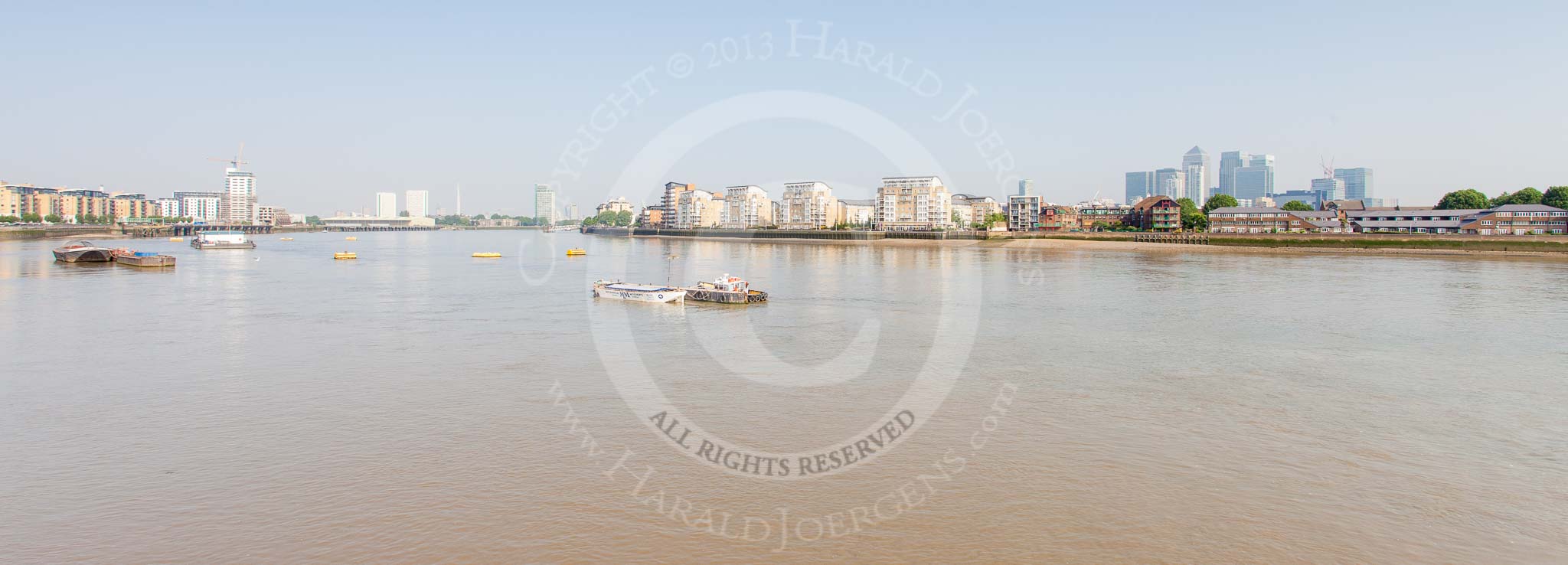 TOW River Thames Barge Driving Race 2013: Looking up the River Thames from Greenwich Pier - on the right Canary Wharf, in the centre another competing barge, "Spirit of Mountbatten" by Mechanical Movements and Enabling Services Ltd..
River Thames between Greenwich and Westminster,
London,

United Kingdom,
on 13 July 2013 at 09:07, image #9