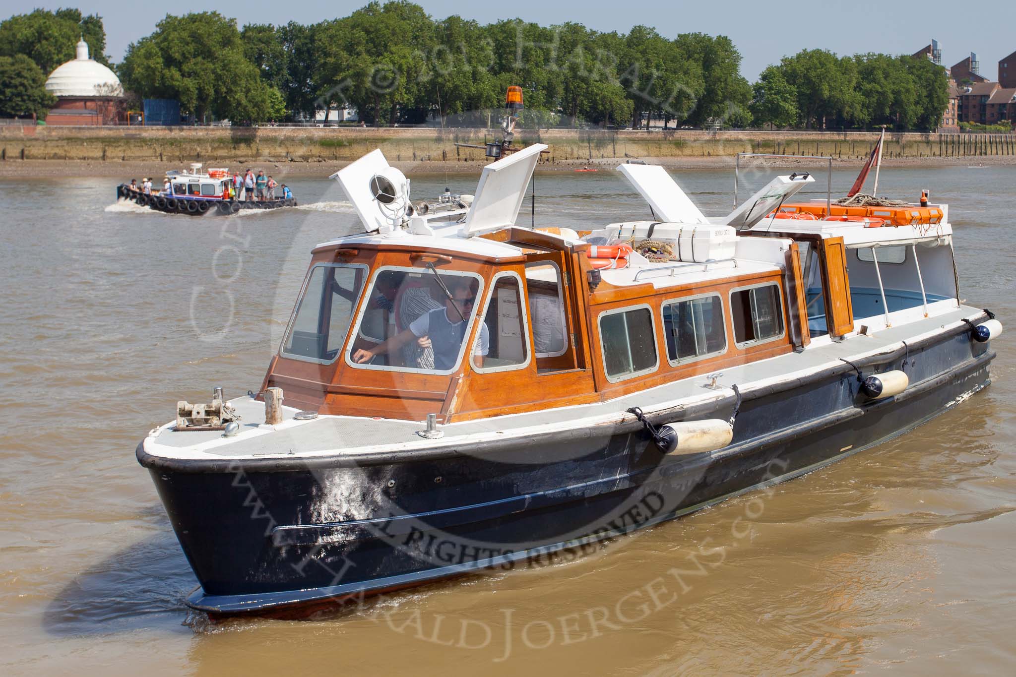 TOW River Thames Barge Driving Race 2013: The high speed Thames Launch "John Harriot", by Thames Executive Charters, arriving at Greenwich pier to pick up the umpire and the the photographer..
River Thames between Greenwich and Westminster,
London,

United Kingdom,
on 13 July 2013 at 11:11, image #26