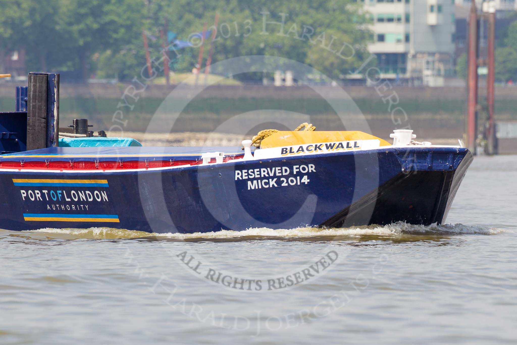 TOW River Thames Barge Driving Race 2013: Another competing barge, "Blackwall" by the Port of London Authority, is pushed to the start of the race..
River Thames between Greenwich and Westminster,
London,

United Kingdom,
on 13 July 2013 at 11:36, image #30