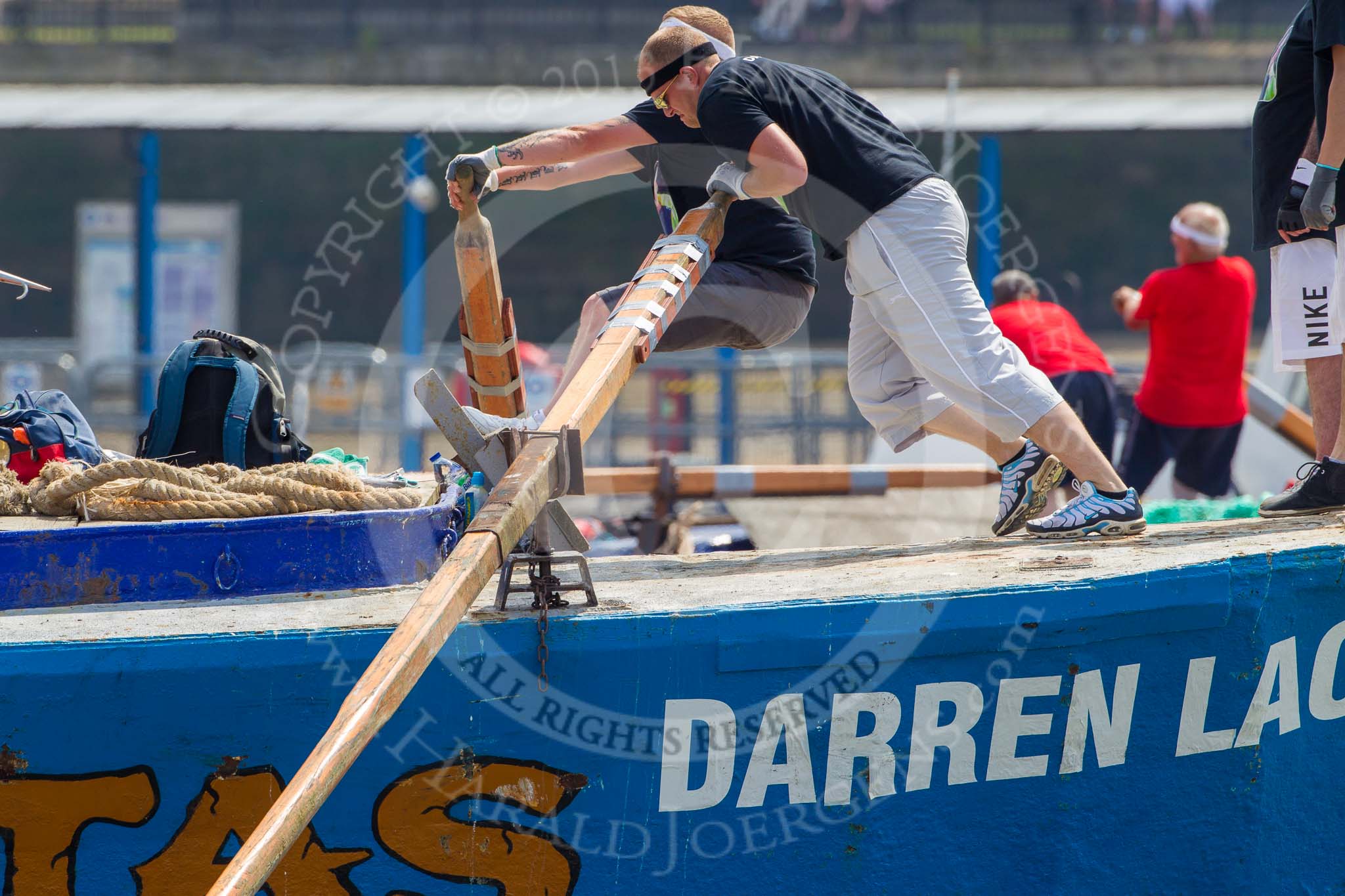 TOW River Thames Barge Driving Race 2013: The race is on - barge "Darren Lacey", by Princess Pocahontas, is pulled away from tug "Vincia". In the background the crew of barge "Spirit of Mountabatten", by Mechanical Movements and Enabling Services Ltd,.
River Thames between Greenwich and Westminster,
London,

United Kingdom,
on 13 July 2013 at 12:34, image #104
