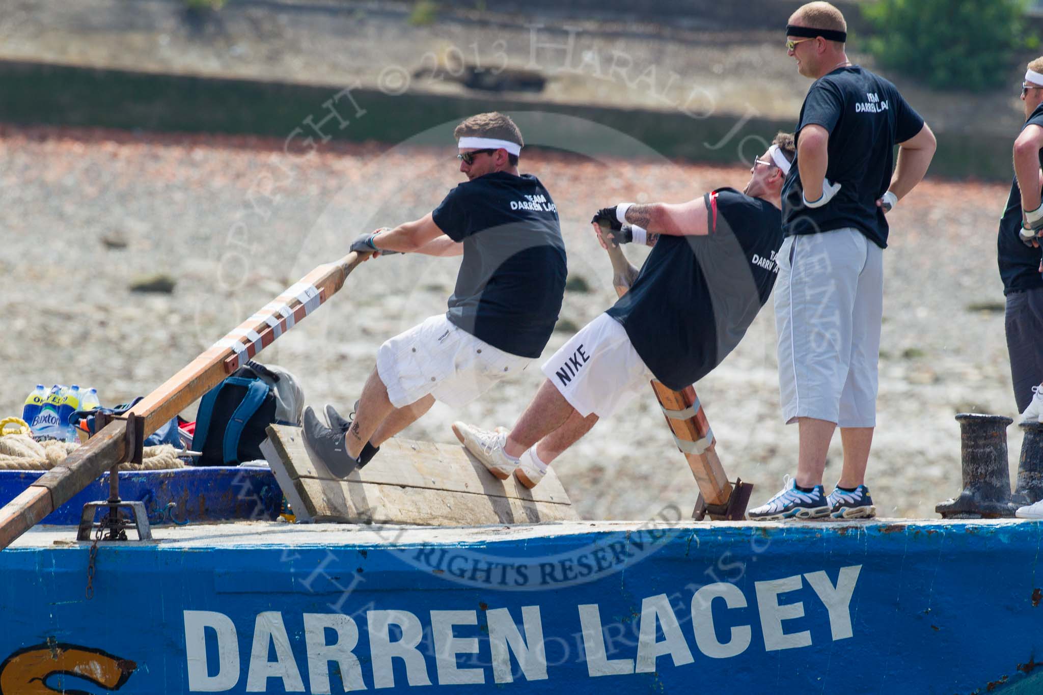 TOW River Thames Barge Driving Race 2013: Rowers on the deck of of barge "Darren Lacey", by Princess Pocahontas, during the race..
River Thames between Greenwich and Westminster,
London,

United Kingdom,
on 13 July 2013 at 12:37, image #131