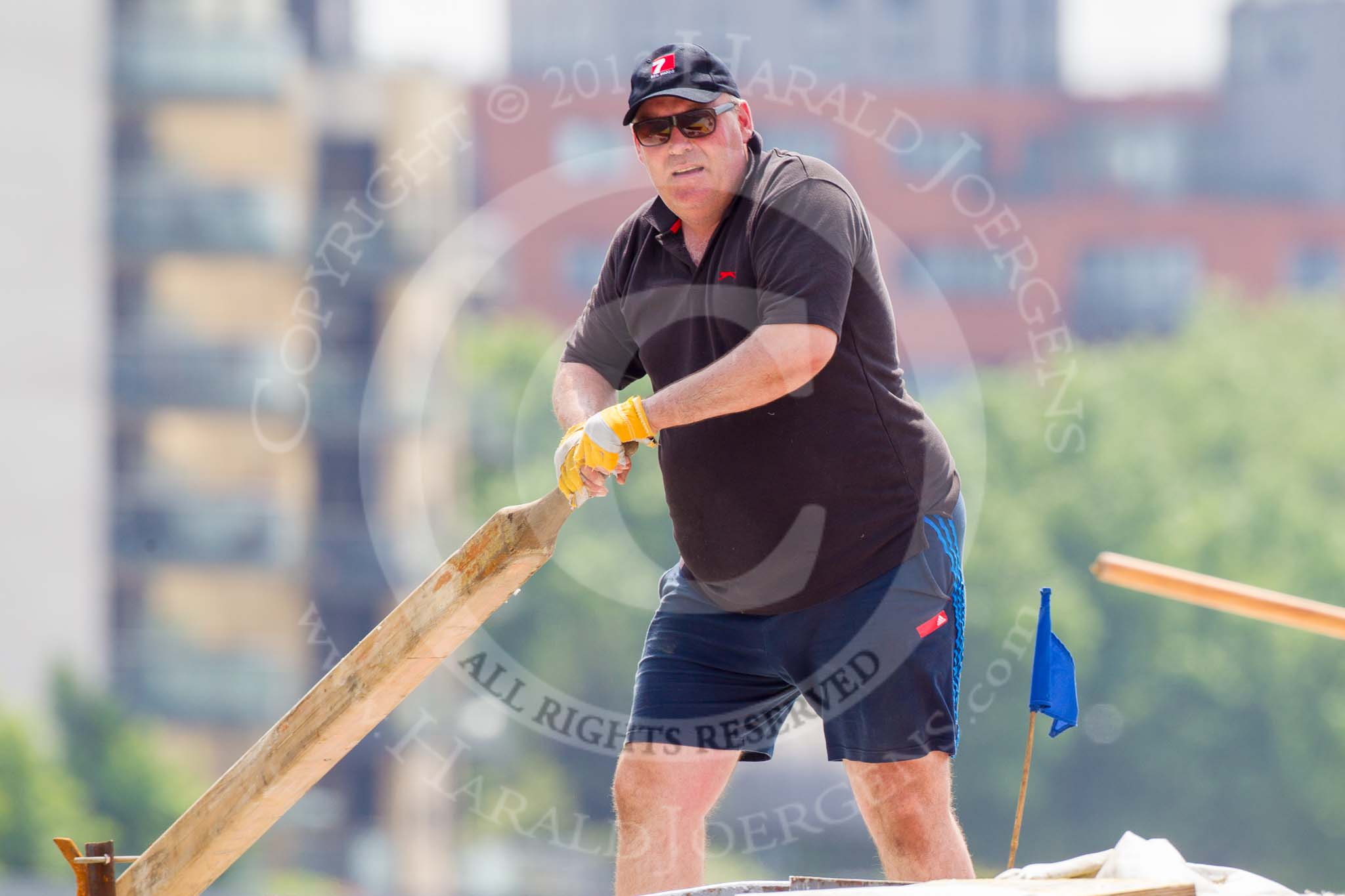TOW River Thames Barge Driving Race 2013: The steerer on board of barge "Steve Faldo" by Capital Pleasure Boats..
River Thames between Greenwich and Westminster,
London,

United Kingdom,
on 13 July 2013 at 13:01, image #259