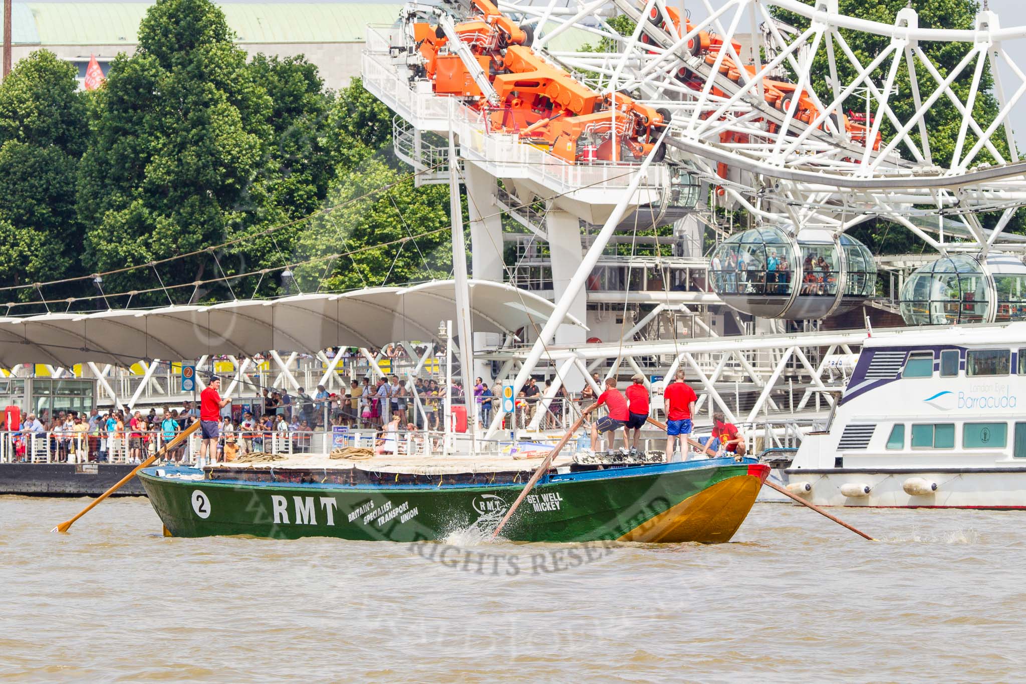 TOW River Thames Barge Driving Race 2013: Barge "Jane", by the RMT Union, at Hungerford Bridge and the London Eye, close to the race finish at Westminster Bridge..
River Thames between Greenwich and Westminster,
London,

United Kingdom,
on 13 July 2013 at 14:28, image #471
