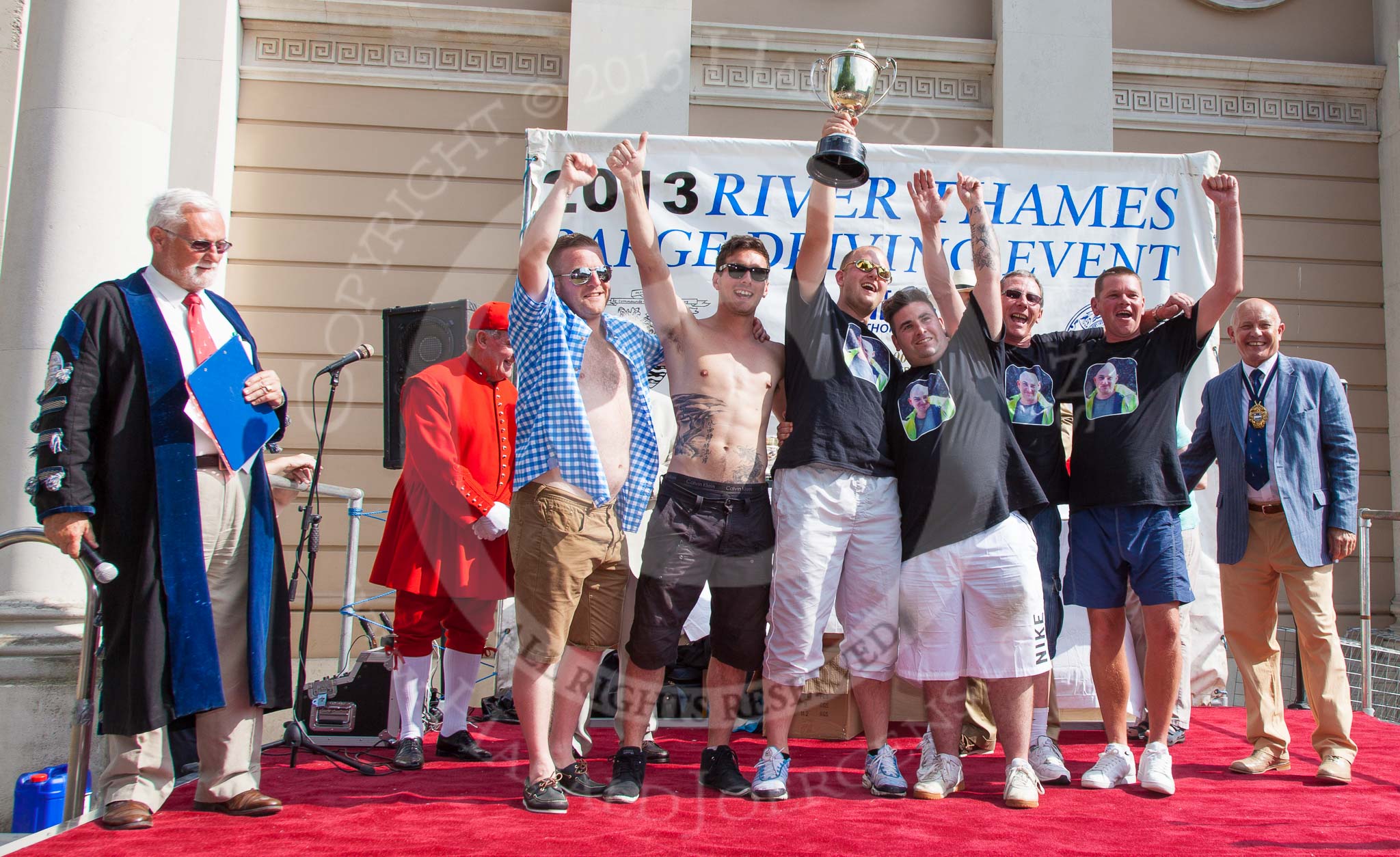 Photo 1307131623055D24910HaraldJoergens TOW River Thames Barge Driving Race 2013: The "Harry Hayword Award", for the first crew with two pennants, goes to the crew of barge "Darren Lacey", by Princess Pocahontas..
River Thames between Greenwich and Westminster,
London,
United Kingdom,
on 13 July 2013 at 16:23, image #572