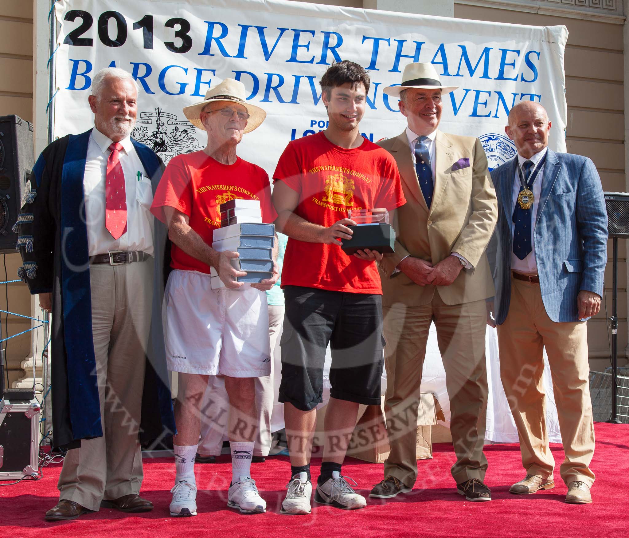 Photo 1307131635215D24946HaraldJoergens TOW River Thames Barge Driving Race 2013: The "Alan C. Bennet Memorial Trophy", for the best painted barge, goes to the crew of "The Matchgirls" (ex Balfour) by by Unite the Union
..
River Thames between Greenwich and Westminster,
London,
United Kingdom,
on 13 July 2013 at 16:35, image #585
