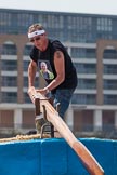 TOW River Thames Barge Driving Race 2013: The steerer on board of barge "Darren Lacey", by Princess Pocahontas, getting ready for the race..
River Thames between Greenwich and Westminster,
London,

United Kingdom,
on 13 July 2013 at 12:23, image #79