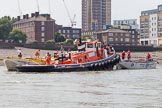 TOW River Thames Barge Driving Race 2013: Barge "Hoppy", by GPS Fabrication, on the left, and barge "Spirit of Mountabatten", by Mechanical Movements and Enabling Services Ltd, in front of GPS Marine tug "GPS Vincia"..
River Thames between Greenwich and Westminster,
London,

United Kingdom,
on 13 July 2013 at 12:24, image #80