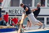 TOW River Thames Barge Driving Race 2013: The race is on - barge "Darren Lacey", by Princess Pocahontas, is pulled away from tug "Vincia". In the background the crew of barge "Spirit of Mountabatten", by Mechanical Movements and Enabling Services Ltd,.
River Thames between Greenwich and Westminster,
London,

United Kingdom,
on 13 July 2013 at 12:34, image #105