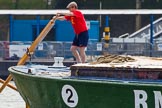 TOW River Thames Barge Driving Race 2013: The steerer of barge "Jane", by the RMT Union, after the start of the race..
River Thames between Greenwich and Westminster,
London,

United Kingdom,
on 13 July 2013 at 12:35, image #112