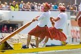 TOW River Thames Barge Driving Race 2013: rowers wearing skirts on the deck of of barge "Hoppy" by GPS Fabrication..
River Thames between Greenwich and Westminster,
London,

United Kingdom,
on 13 July 2013 at 12:36, image #123