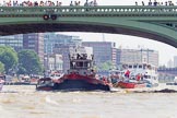 TOW River Thames Barge Driving Race 2013: Barges on the way back to Greenwich, passing Hungerford Bridge, here tug "Aicirton" pulling barge "Jane", by the RMT Union..
River Thames between Greenwich and Westminster,
London,

United Kingdom,
on 13 July 2013 at 14:42, image #515