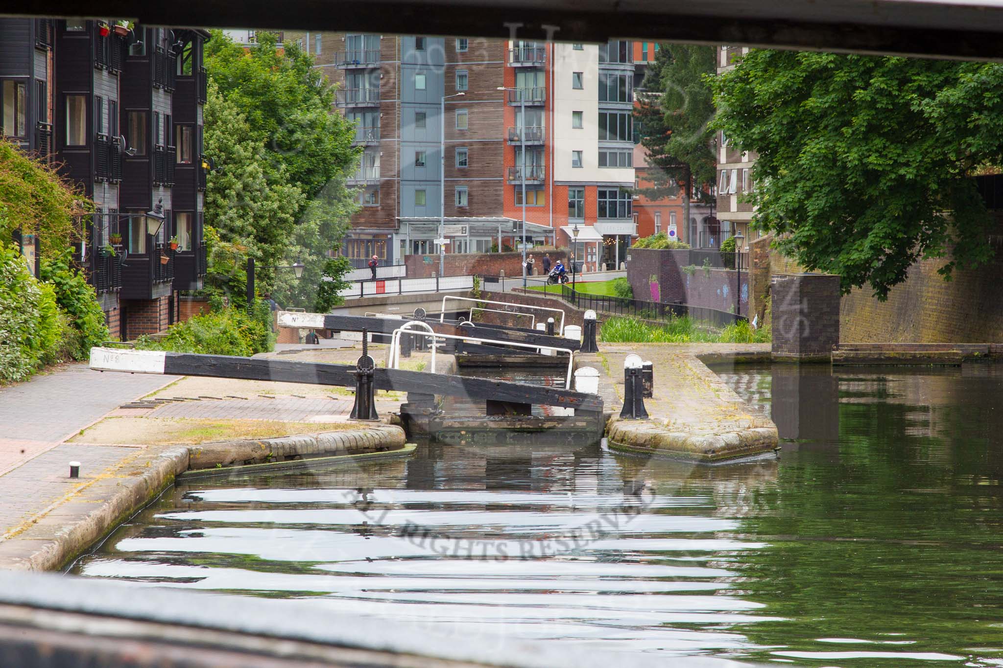 BCN Marathon Challenge 2014: View from the lock #2 of the 13 Farmers Bridge Locks on the Birmingham & Fazeley Canal, taking the canal 81ft (27m) down to the 372' level. The canal disappears under the road bridge..
Birmingham Canal Navigation,


United Kingdom,
on 23 May 2014 at 13:45, image #17