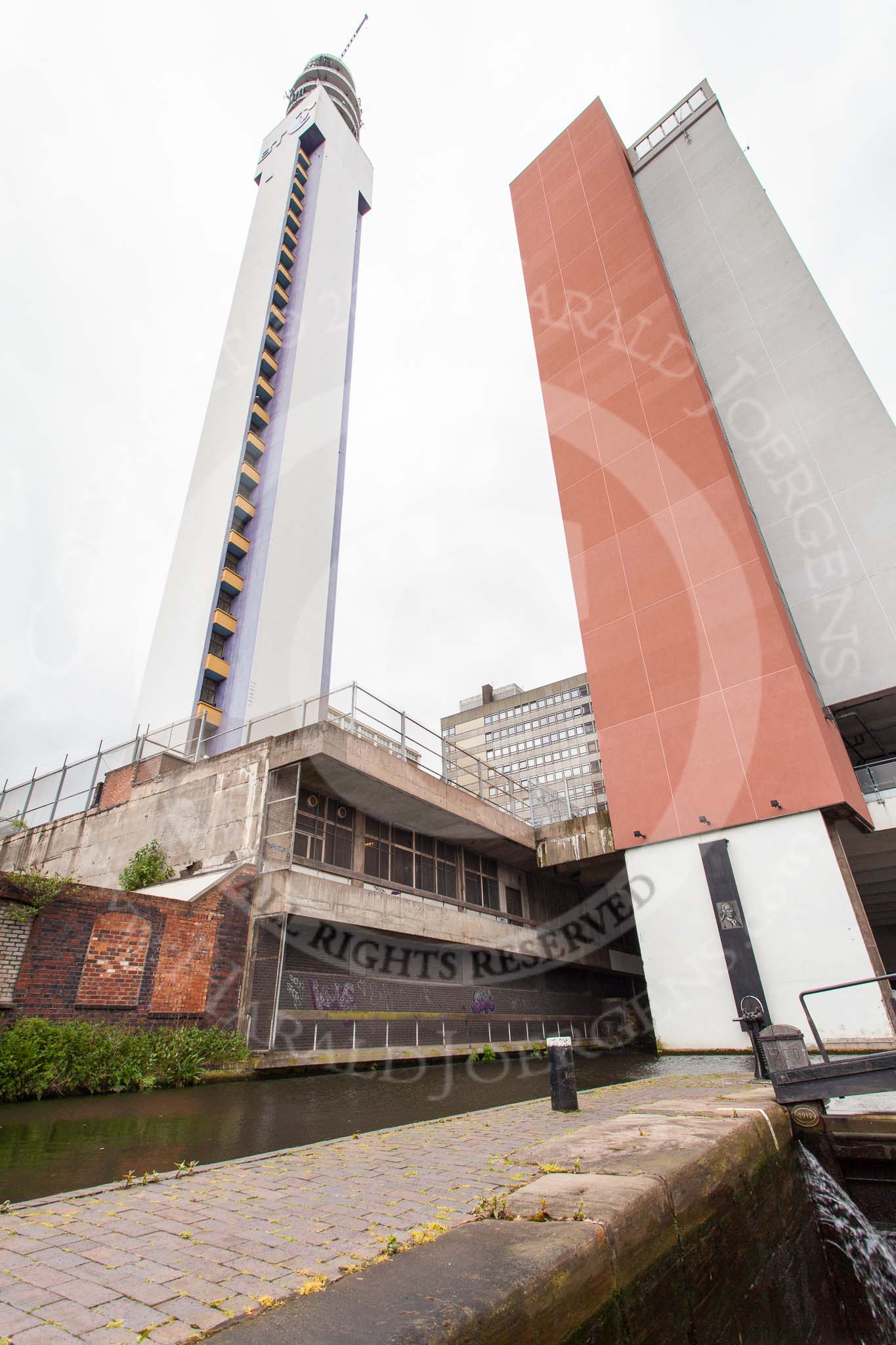 BCN Marathon Challenge 2014: Old and new at the Farmers Bridge Flight, Birmingham & Fazeley Canal, The BT Tower and a modern building contrast with the canal, and the old brick building on the left..
Birmingham Canal Navigation,


United Kingdom,
on 23 May 2014 at 14:50, image #33