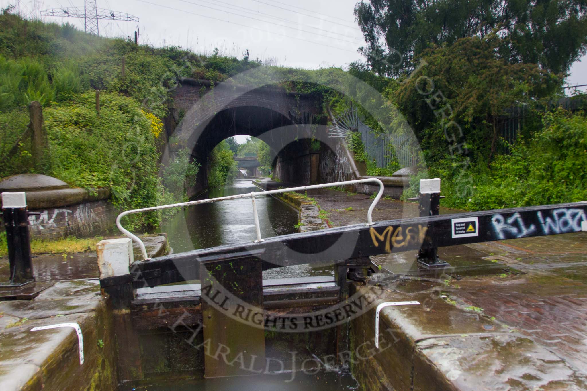 BCN Marathon Challenge 2014: The second of the Garrison Locks (no 60) on the Grand Union Canal (Birmingham & Warwick Junction Canal), with bridge 104C (Landor Street Railway Bridge) behind.
Birmingham Canal Navigation,


United Kingdom,
on 23 May 2014 at 17:13, image #69