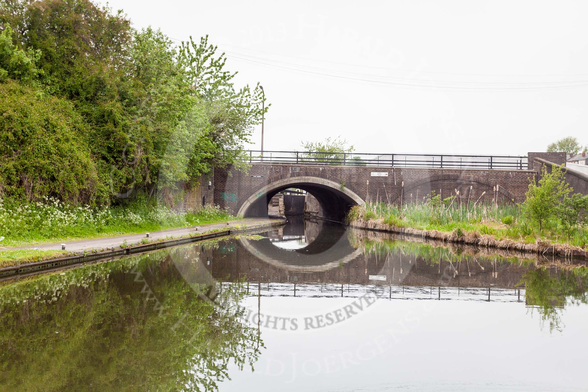 BCN 24h Marathon Challenge 2015: Pope Bridge, with Smethwick Bottom Lock No 3 behind, on the BCN Old Main Line. The right arch of the bridge was for Brindley's orginal locks, the locks on the left is for Smeaton's duplicate flight..
Birmingham Canal Navigations,



on 23 May 2015 at 10:09, image #59