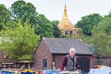 BCN 24h Marathon Challenge 2015: BCNS chairman Charley Johnston steering "Felonious Mongoose" through Icknield Port Loop, with the Dhammatalaka Peace Pagoda (Birmingham Buddhist Vihara) behind.
Birmingham Canal Navigations,



on 23 May 2015 at 08:51, image #19