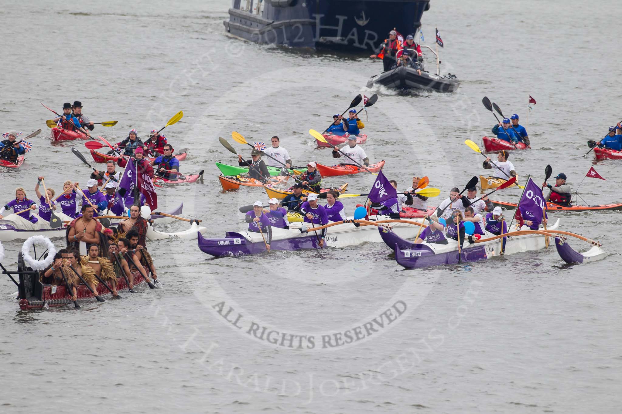 Thames Diamond Jubilee Pageant: WAKA & CANOE-Te Hono ki Aoteroa ( New Zealand) (M193), HAWAIIAN OUTRIGGERS-Holo Nui (M197),Kaimana (M195)..
River Thames seen from Battersea Bridge,
London,

United Kingdom,
on 03 June 2012 at 14:49, image #135