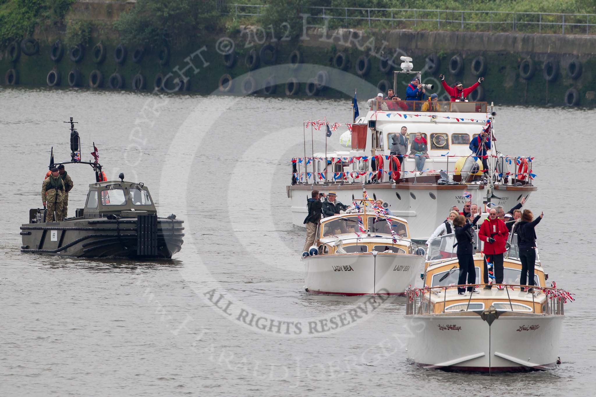 Thames Diamond Jubilee Pageant: LAUNCHES- Louis Phillipe (H52), Lady Bea (H56) and FORCES Amiens RASC (H61) and  Combat Support Boat (H59)..
River Thames seen from Battersea Bridge,
London,

United Kingdom,
on 03 June 2012 at 15:20, image #326