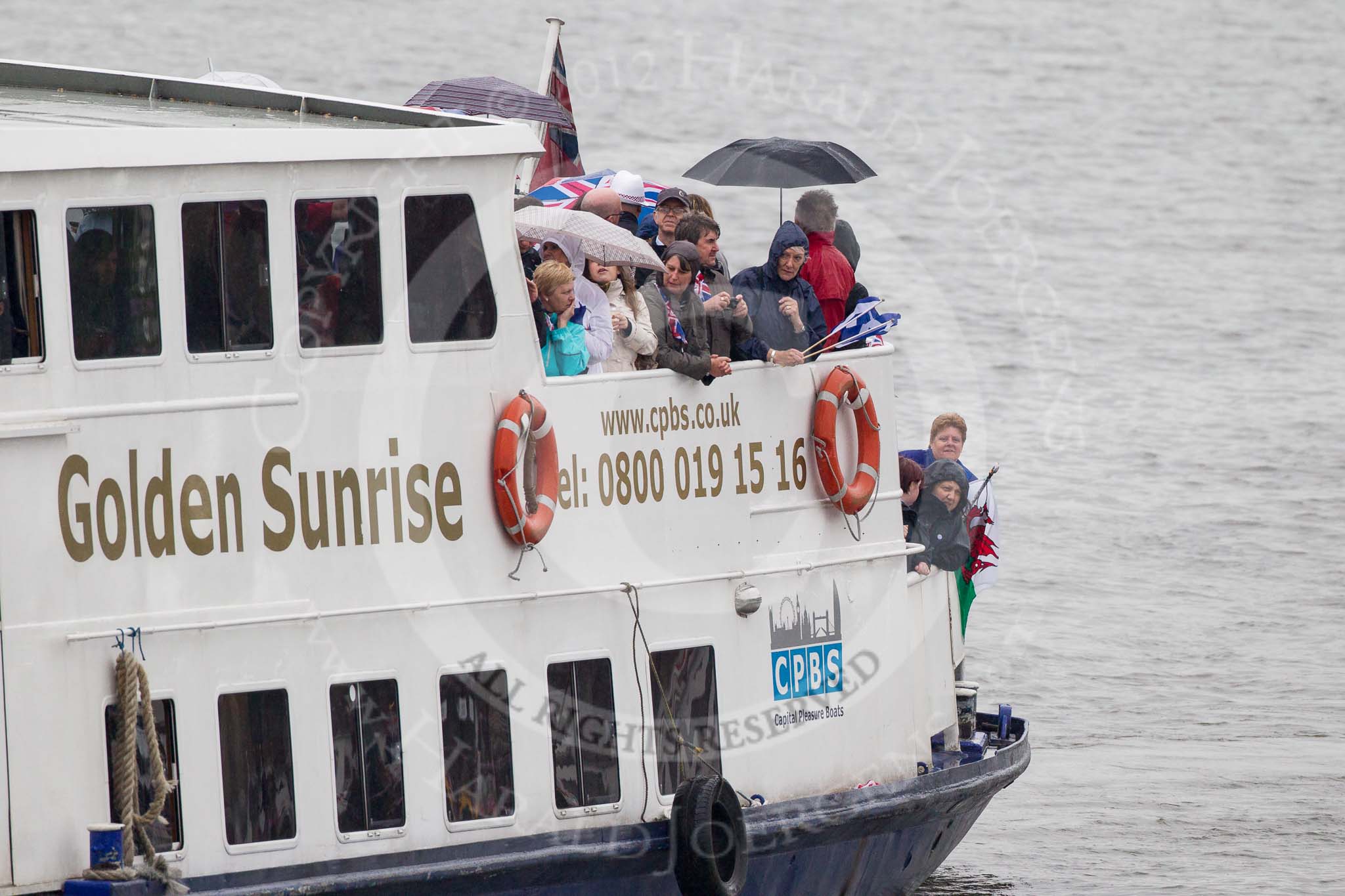 Thames Diamond Jubilee Pageant: PASSENGER BOATS- Golden Sunrise (C13)..
River Thames seen from Battersea Bridge,
London,

United Kingdom,
on 03 June 2012 at 16:11, image #548