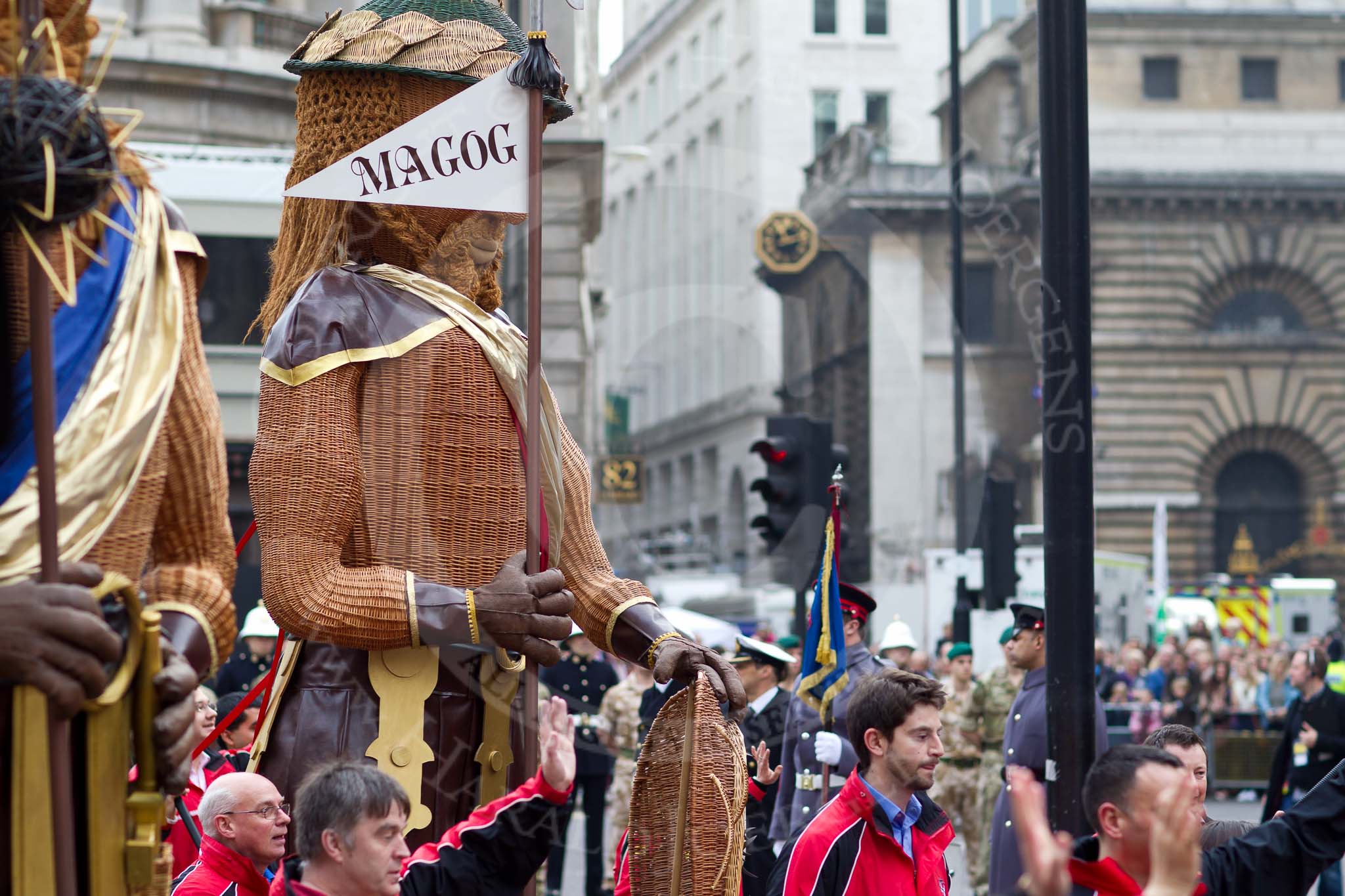 The Lord Mayor's Show 2011: Society of Young Freemen (http://www.youngfreemen.com/), Gog and Magog (https://lordmayorshow.org/visitors/procession/gogmagog), RA 100 (100th Regiment Royal Artillery)..
Opposite Mansion House, City of London,
London,
-,
United Kingdom,
on 12 November 2011 at 11:07, image #112