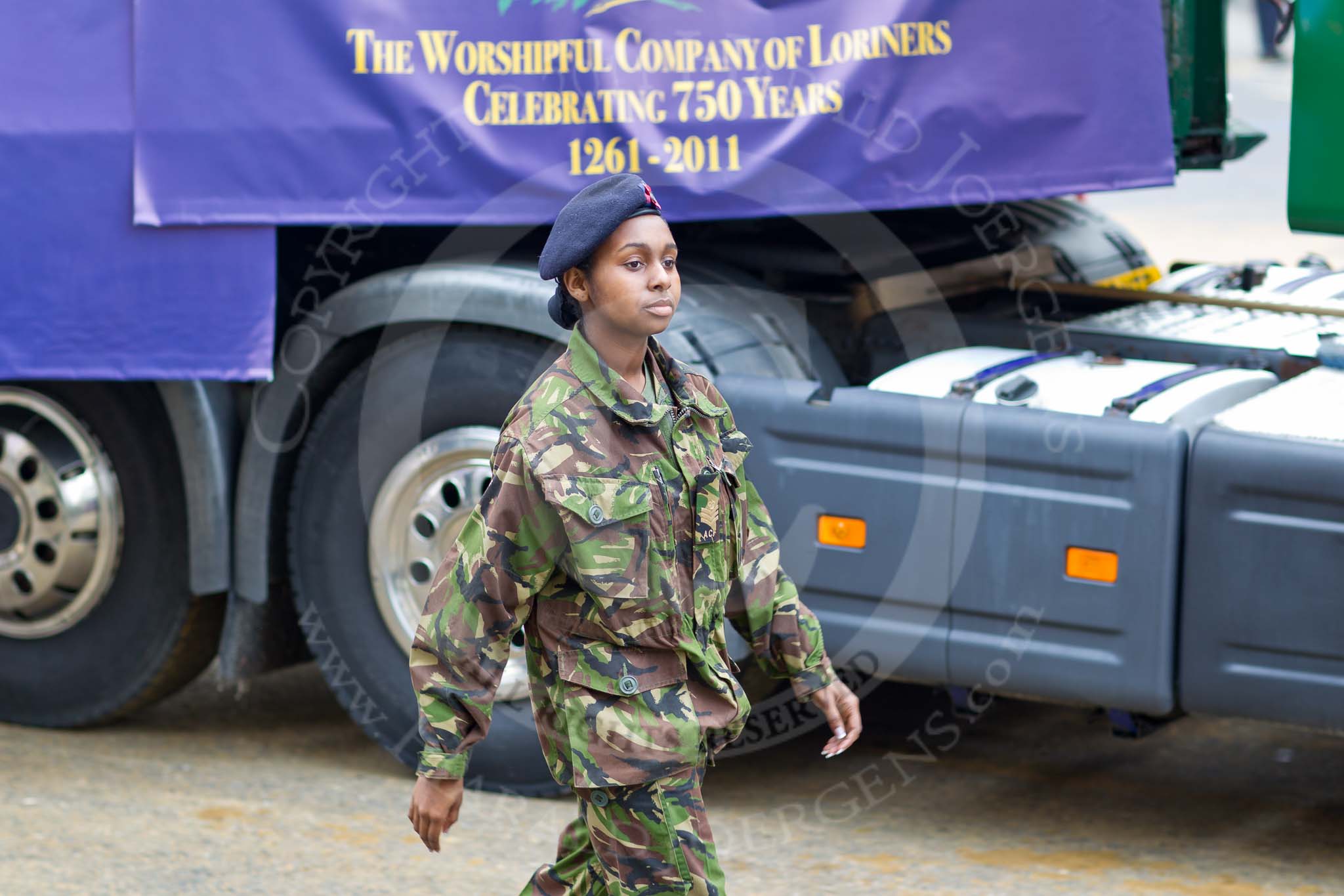 The Lord Mayor's Show 2011: The Worshipful Company of Loriners (http://www.loriner.co.uk/) a female Cadet Sergeant from the Army Cadet Force (ACF) in front of the float..
Opposite Mansion House, City of London,
London,
-,
United Kingdom,
on 12 November 2011 at 11:32, image #338