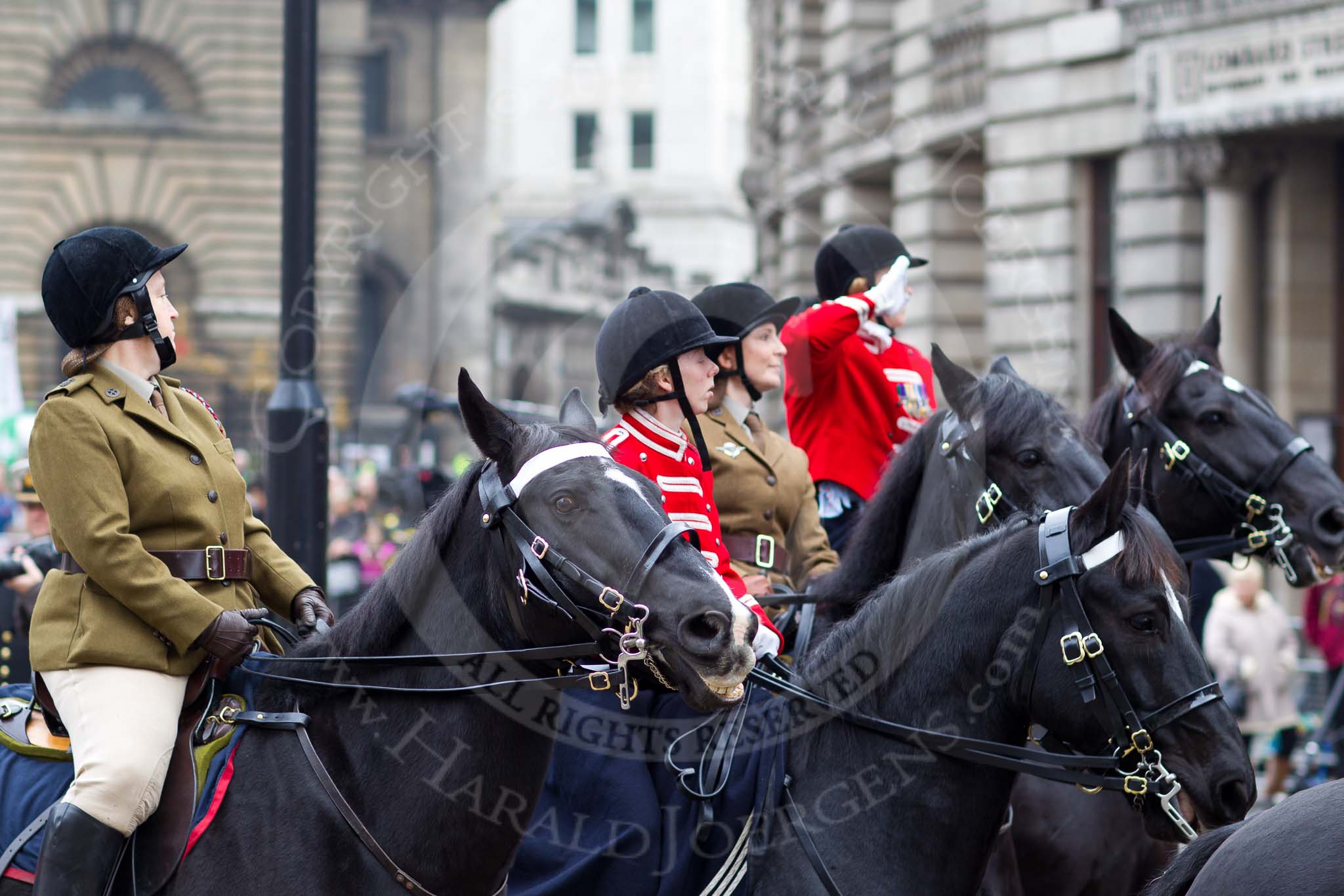 The Lord Mayor's Show 2011: FANY (Princess Royal's Volunteer Corps, http://www.fany.org.uk/): The ladies in front and in the middle are dressed in original 1907 uniforms, the two others in the current service dress. The FANY giving the salute in the background  is the Commanding Officer, Commandant Kim McCutcheon ..
Opposite Mansion House, City of London,
London,
-,
United Kingdom,
on 12 November 2011 at 11:39, image #394