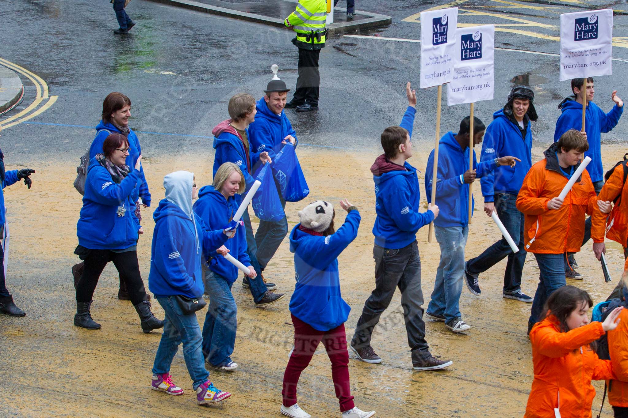 Lord Mayor's Show 2012: Entry 13 - Worshipful Company of Lightmongers, with New College Worcester for the blind and partially sighted, and Mary Hare School for deaf children..
Press stand opposite Mansion House, City of London,
London,
Greater London,
United Kingdom,
on 10 November 2012 at 11:05, image #292