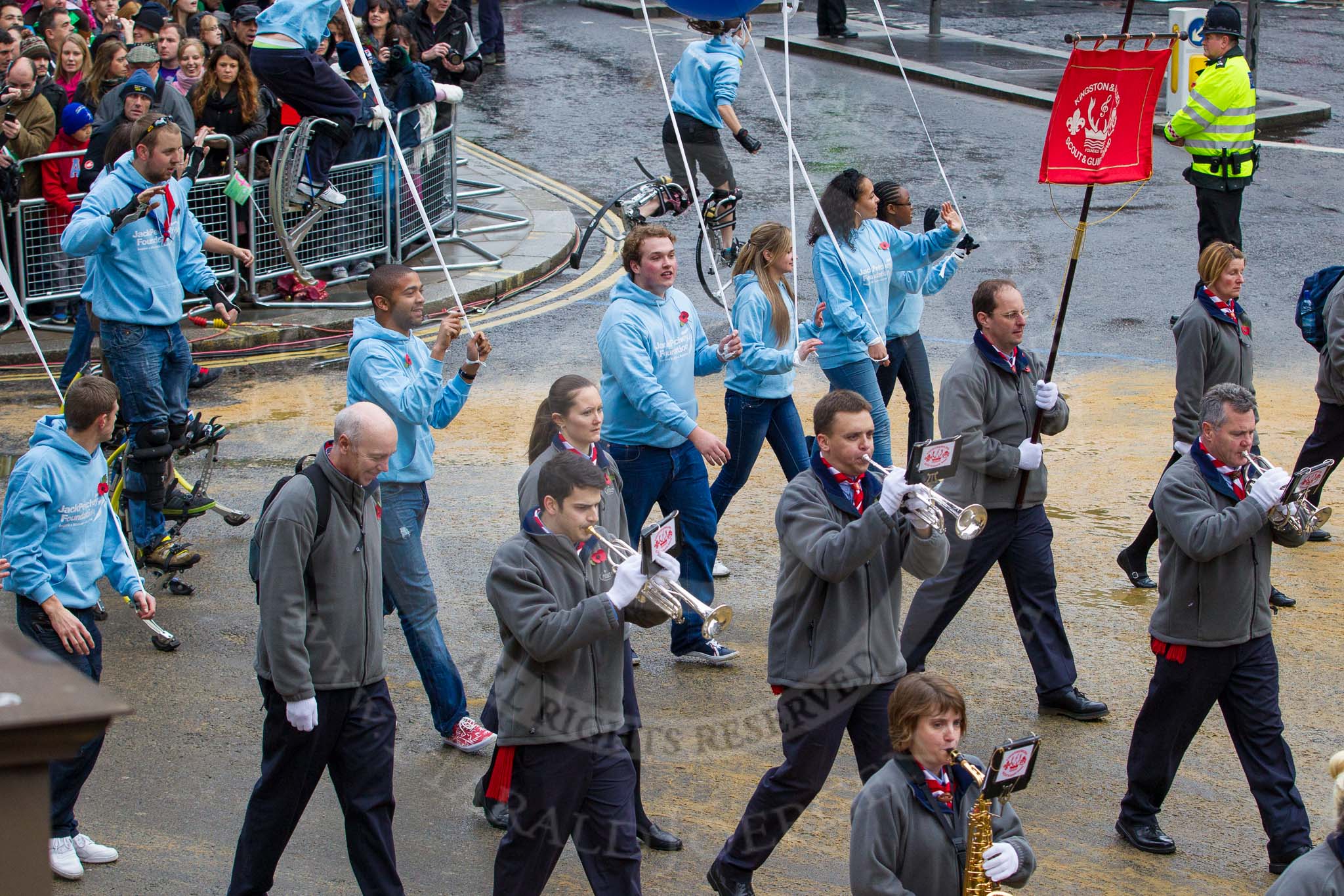 Lord Mayor's Show 2012: Entry 67 - Kingston & Malden Scout & Guide Band and 68 - Jack Petchey Foundation..
Press stand opposite Mansion House, City of London,
London,
Greater London,
United Kingdom,
on 10 November 2012 at 11:29, image #855