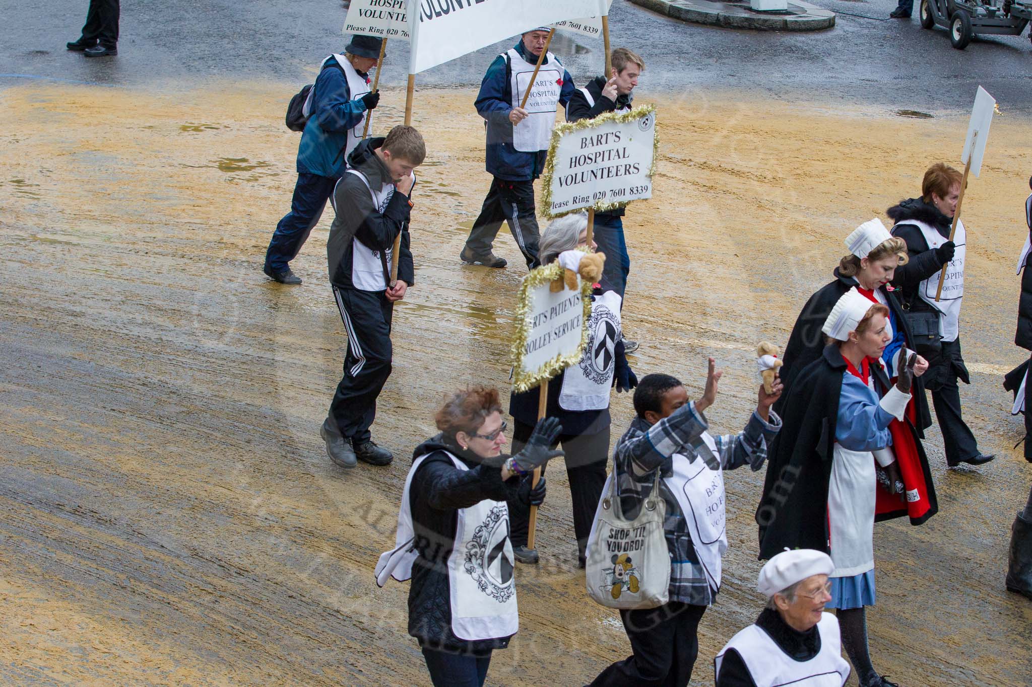 Lord Mayor's Show 2012: Entry 78 - Guild of the Royal Hospital of St Bartholomew (Bart's Hospital)..
Press stand opposite Mansion House, City of London,
London,
Greater London,
United Kingdom,
on 10 November 2012 at 11:34, image #983
