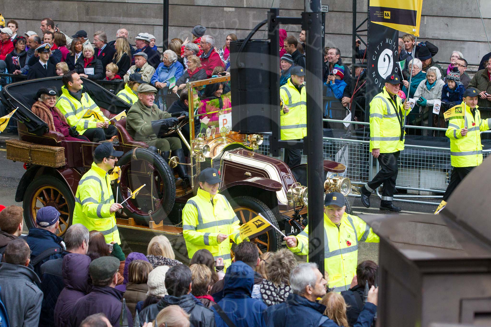 Lord Mayor's Show 2012: Entry 97 - AA, the Automobile Association..
Press stand opposite Mansion House, City of London,
London,
Greater London,
United Kingdom,
on 10 November 2012 at 11:44, image #1276