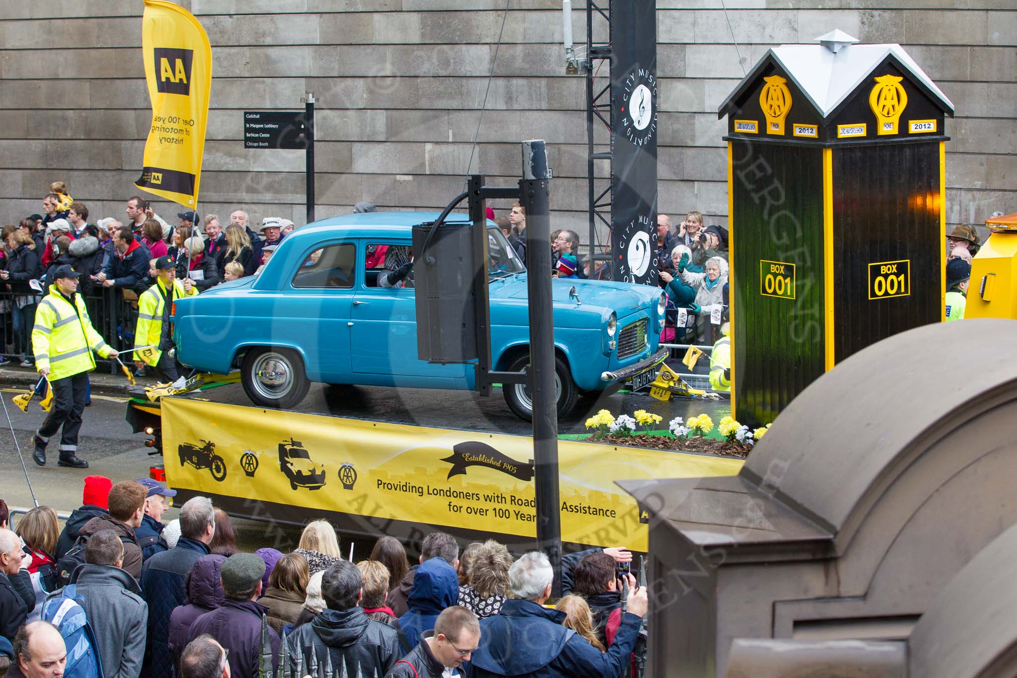 Lord Mayor's Show 2012: Entry 97 - AA, the Automobile Association..
Press stand opposite Mansion House, City of London,
London,
Greater London,
United Kingdom,
on 10 November 2012 at 11:44, image #1292