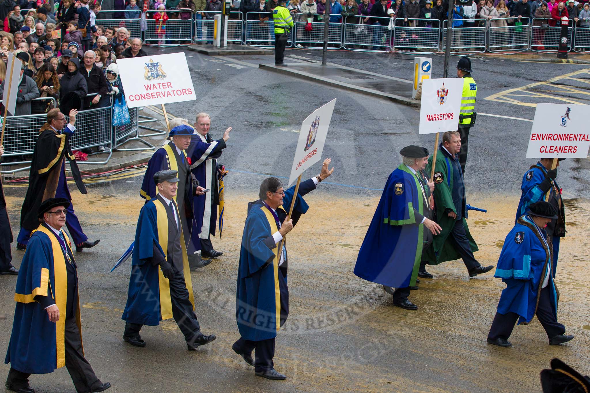 Lord Mayor's Show 2012: Entrry 104 - Modern Livery Companies, representing 26 Livery Companies..
Press stand opposite Mansion House, City of London,
London,
Greater London,
United Kingdom,
on 10 November 2012 at 11:51, image #1424