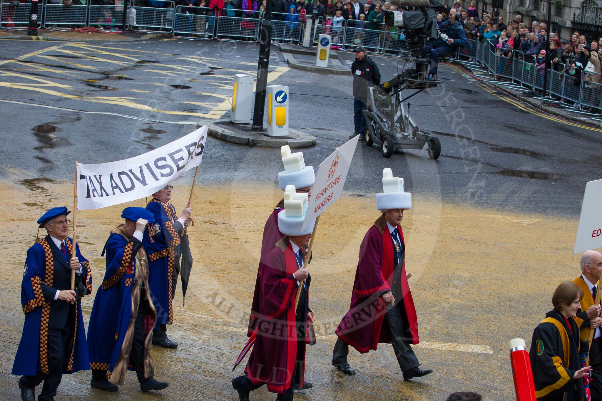 Lord Mayor's Show 2012: Entrry 104 - Modern Livery Companies, representing 26 Livery Companies..
Press stand opposite Mansion House, City of London,
London,
Greater London,
United Kingdom,
on 10 November 2012 at 11:51, image #1436