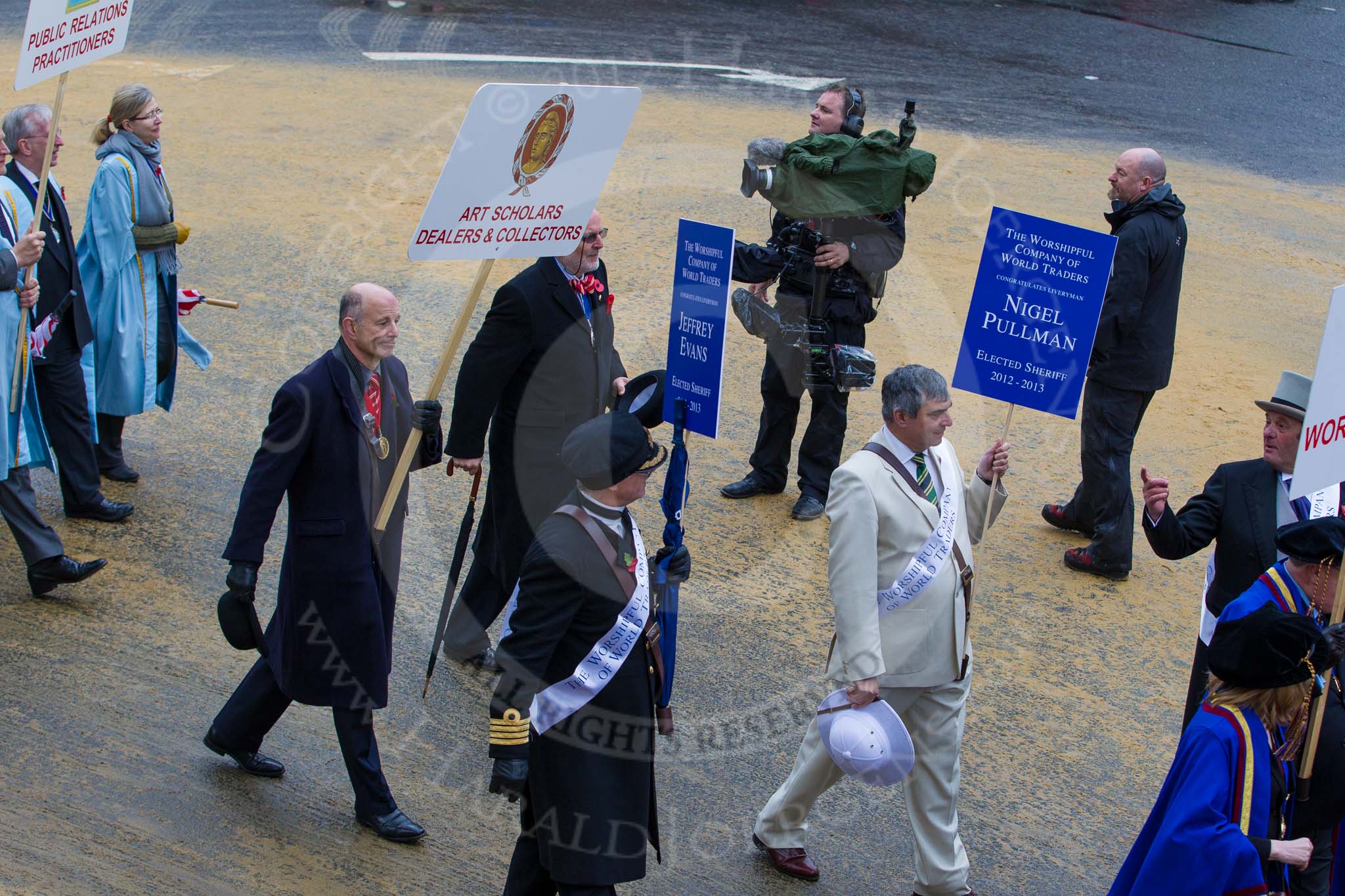 Lord Mayor's Show 2012: Entrry 104 - Modern Livery Companies, representing 26 Livery Companies..
Press stand opposite Mansion House, City of London,
London,
Greater London,
United Kingdom,
on 10 November 2012 at 11:51, image #1446