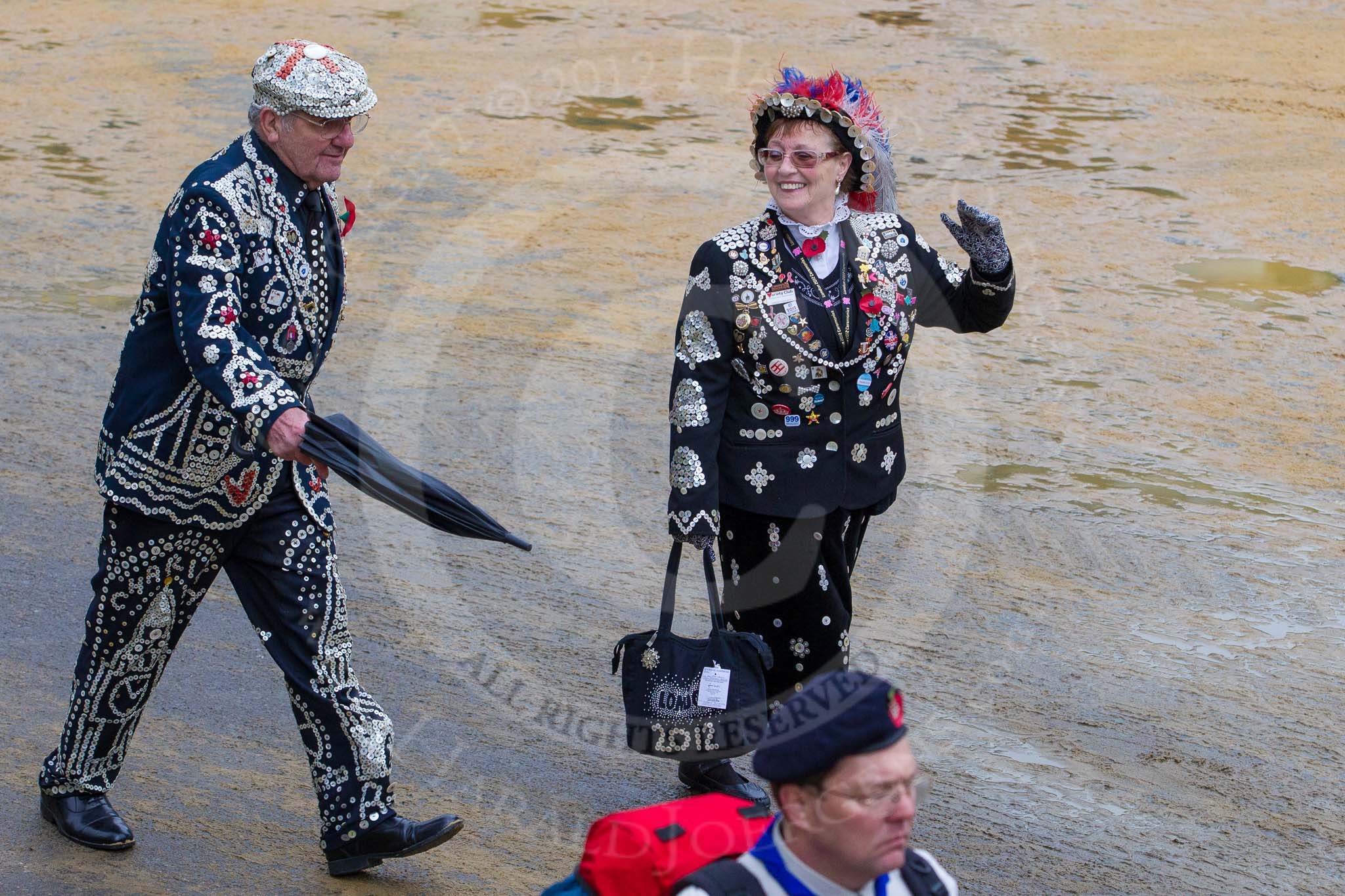Lord Mayor's Show 2012: Entry 105 - Corps of Drums Society, here with a  London Pearly Queen and King..
Press stand opposite Mansion House, City of London,
London,
Greater London,
United Kingdom,
on 10 November 2012 at 11:53, image #1484