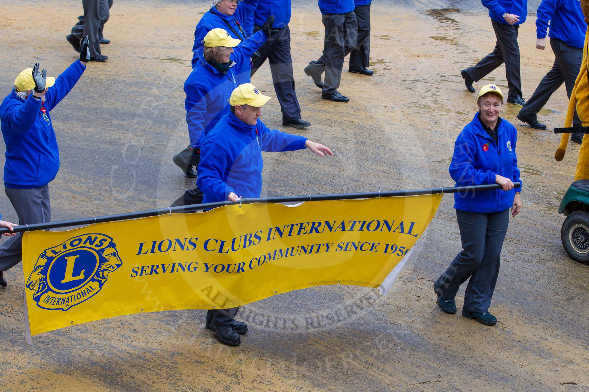 Lord Mayor's Show 2012: Entry 110 - Lions Clubs International..
Press stand opposite Mansion House, City of London,
London,
Greater London,
United Kingdom,
on 10 November 2012 at 11:55, image #1561
