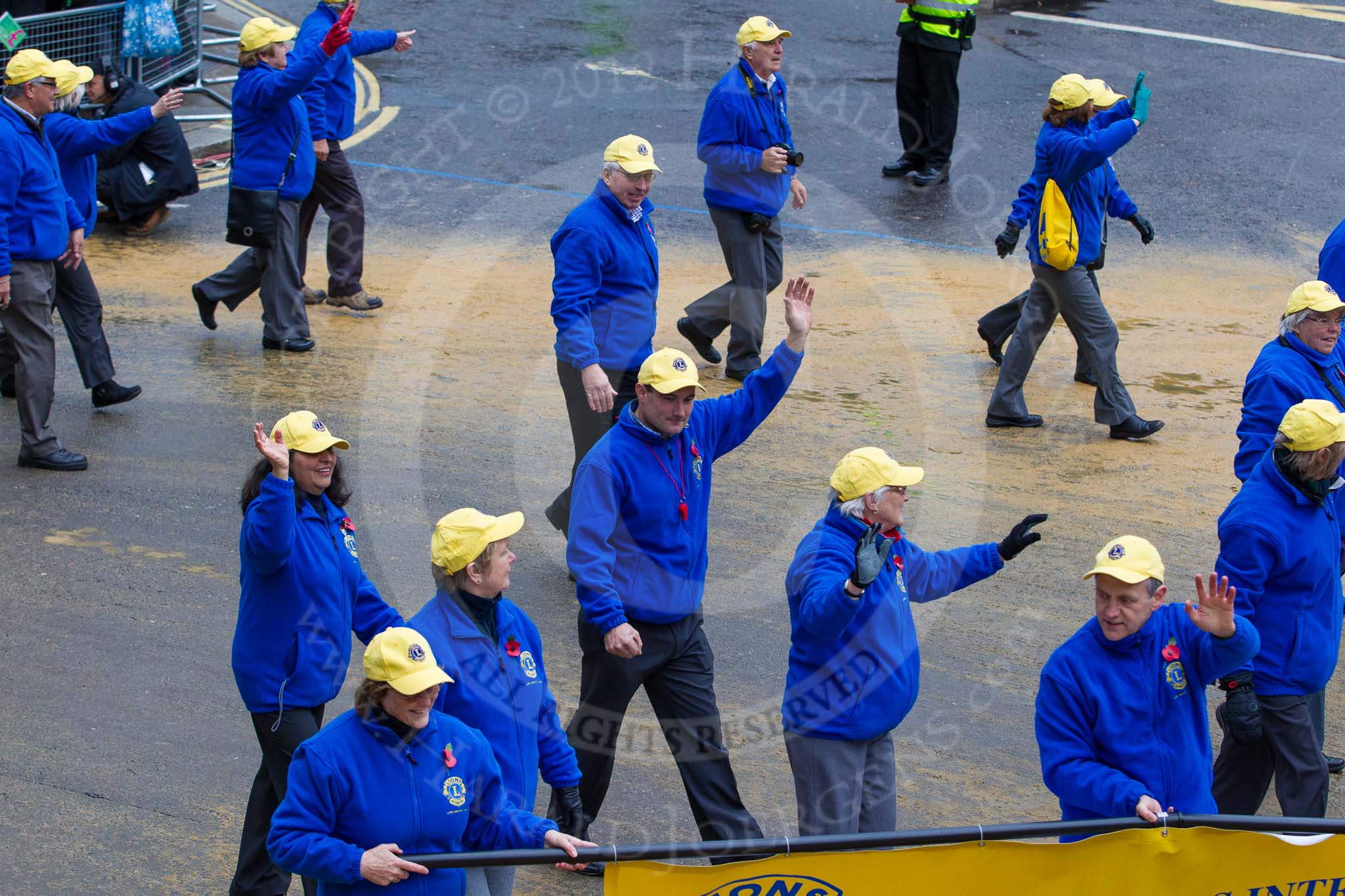 Lord Mayor's Show 2012: Entry 110 - Lions Clubs International..
Press stand opposite Mansion House, City of London,
London,
Greater London,
United Kingdom,
on 10 November 2012 at 11:55, image #1564