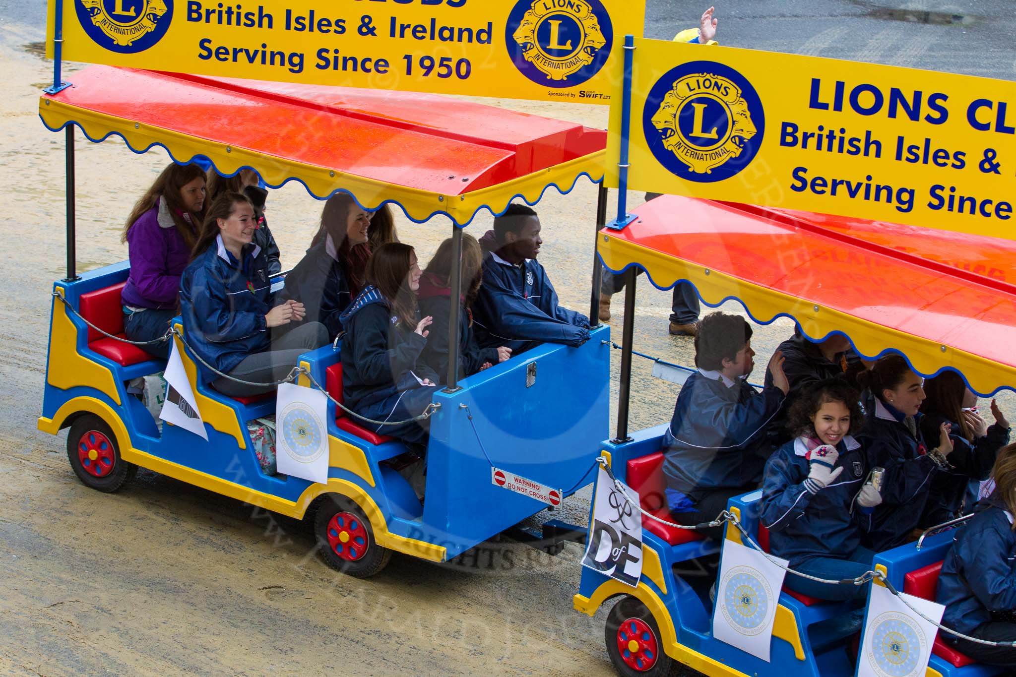 Lord Mayor's Show 2012: Entry 110 - Lions Clubs International..
Press stand opposite Mansion House, City of London,
London,
Greater London,
United Kingdom,
on 10 November 2012 at 11:55, image #1575