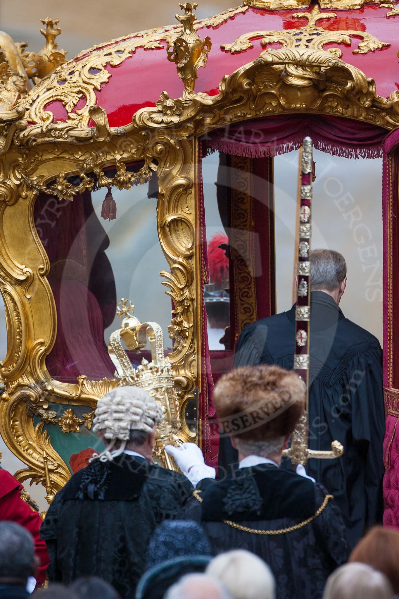 Lord Mayor's Show 2012: The Chaplin, the Sergeant of Arms, and the Sword Bearer, getting into the State Coach..
Press stand opposite Mansion House, City of London,
London,
Greater London,
United Kingdom,
on 10 November 2012 at 12:11, image #1933