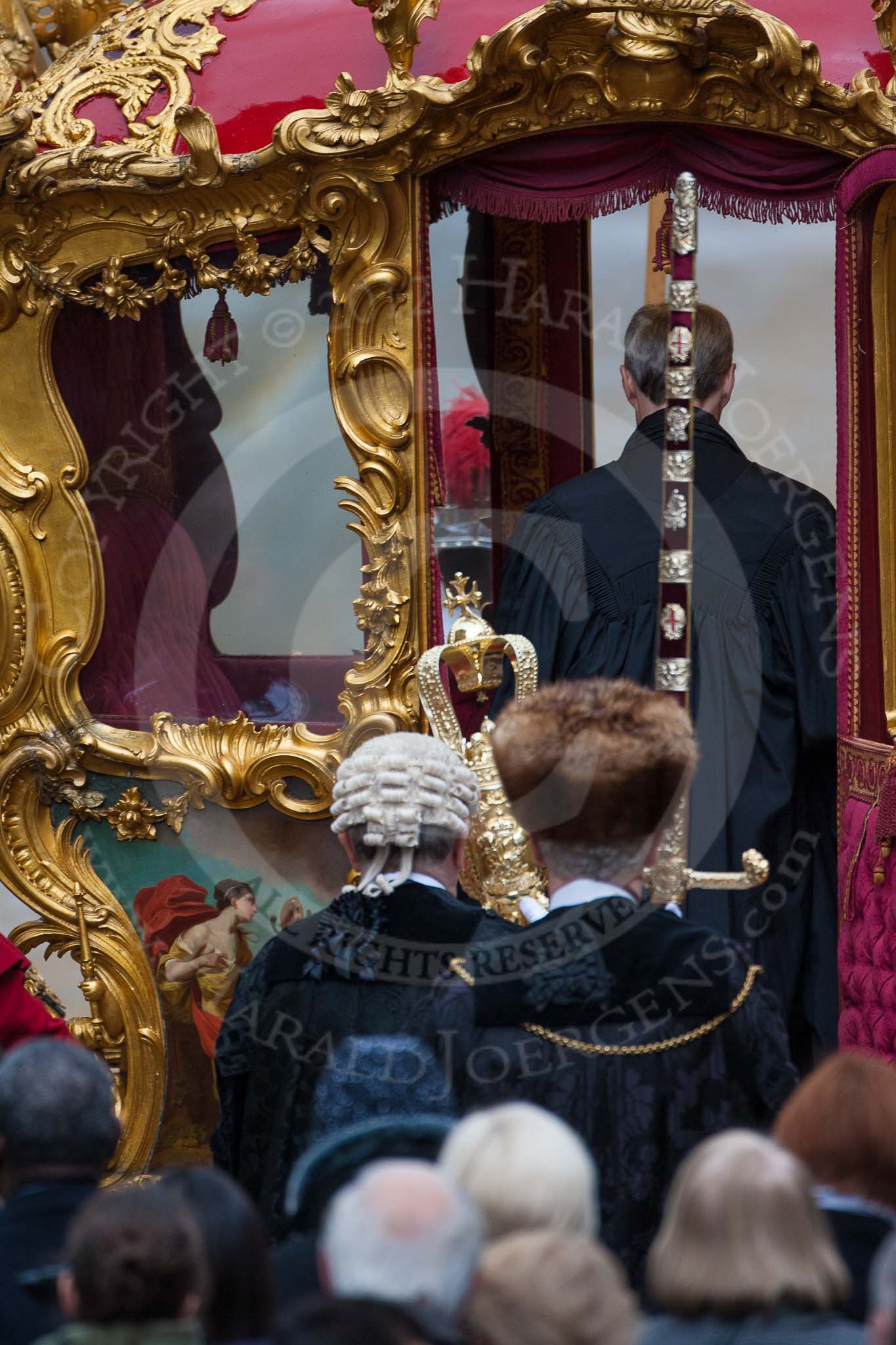 Lord Mayor's Show 2012: The Chaplin, the Sergeant of Arms, and the Sword Bearer, getting into the State Coach..
Press stand opposite Mansion House, City of London,
London,
Greater London,
United Kingdom,
on 10 November 2012 at 12:11, image #1934