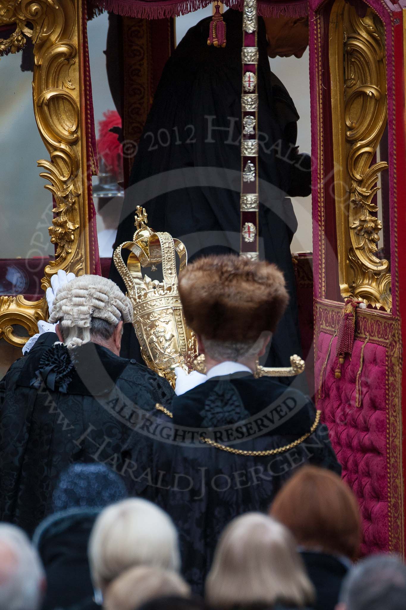 Lord Mayor's Show 2012: The Chaplin, the Sergeant of Arms, and the Sword Bearer, getting into the State Coach..
Press stand opposite Mansion House, City of London,
London,
Greater London,
United Kingdom,
on 10 November 2012 at 12:11, image #1935