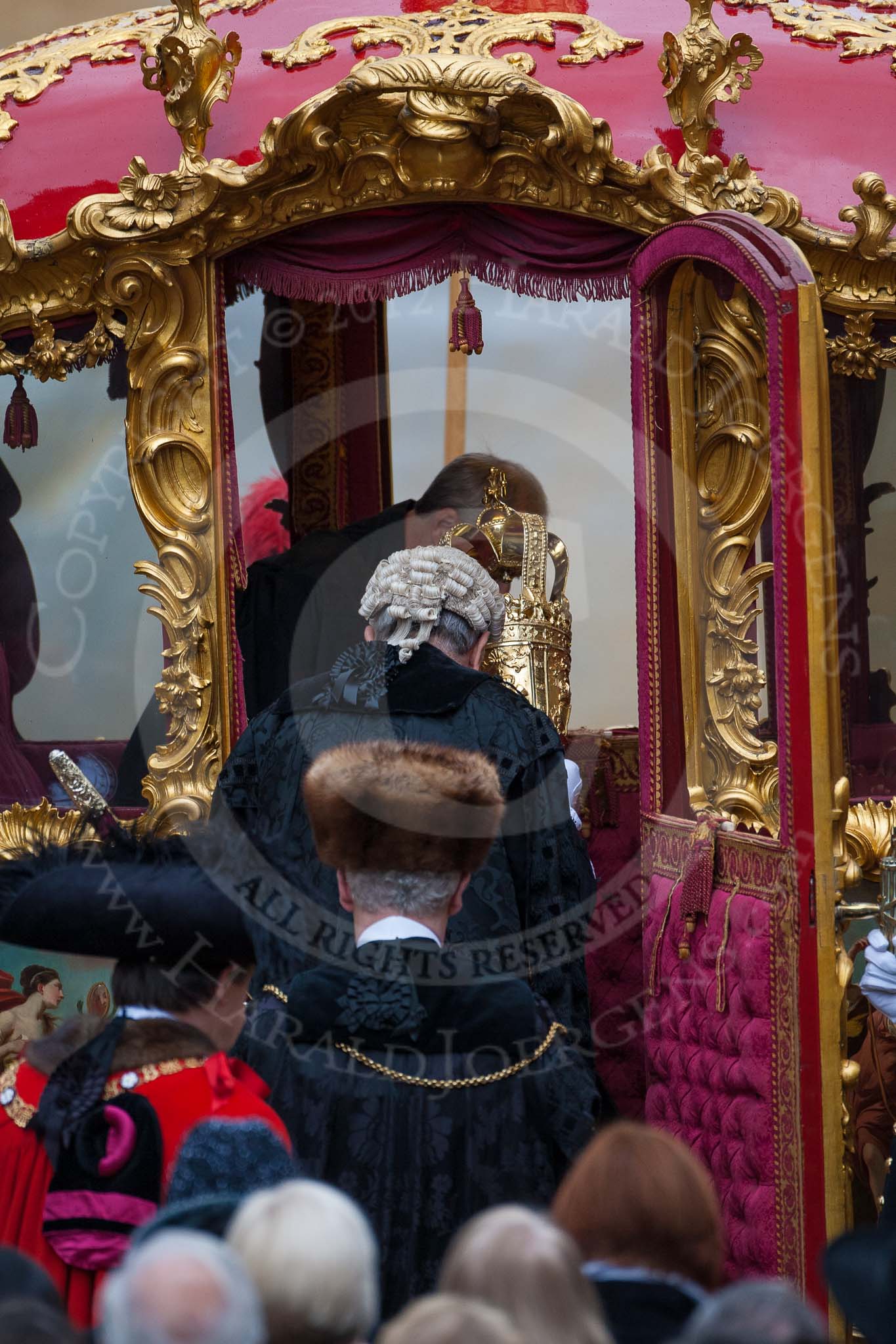 Lord Mayor's Show 2012: The Chaplin, the Sergeant of Arms, and the Sword Bearer, getting into the State Coach..
Press stand opposite Mansion House, City of London,
London,
Greater London,
United Kingdom,
on 10 November 2012 at 12:11, image #1936