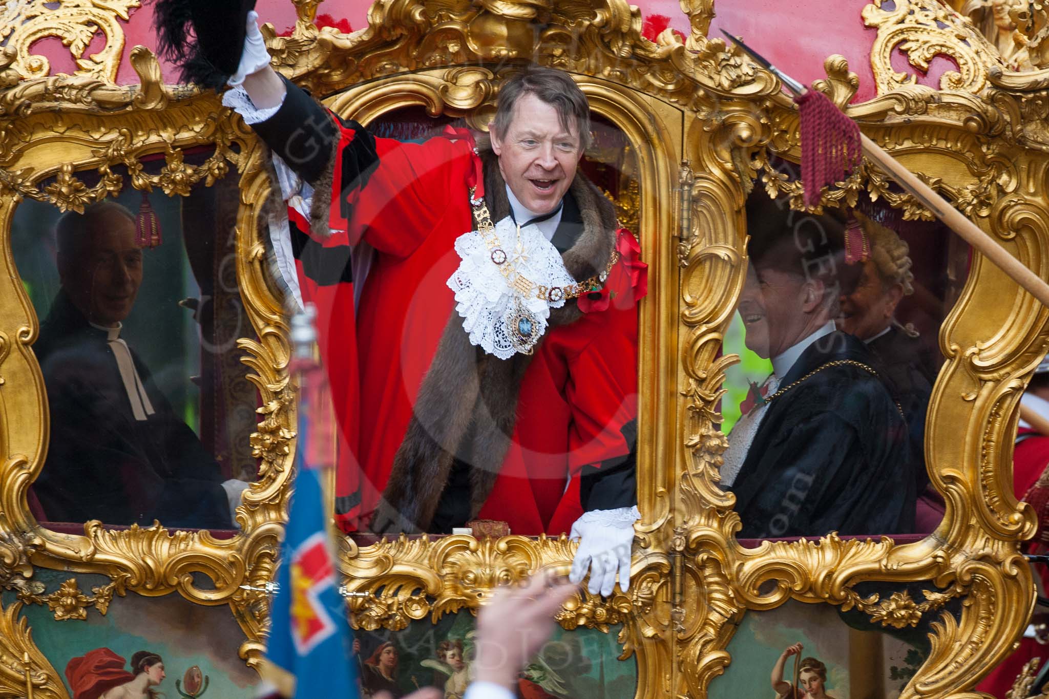 Lord Mayor's Show 2012: Lord Mayor Roger Gifford waving from his carriage as he is about to leave for St Paul's Cathedral..
Press stand opposite Mansion House, City of London,
London,
Greater London,
United Kingdom,
on 10 November 2012 at 12:12, image #1950