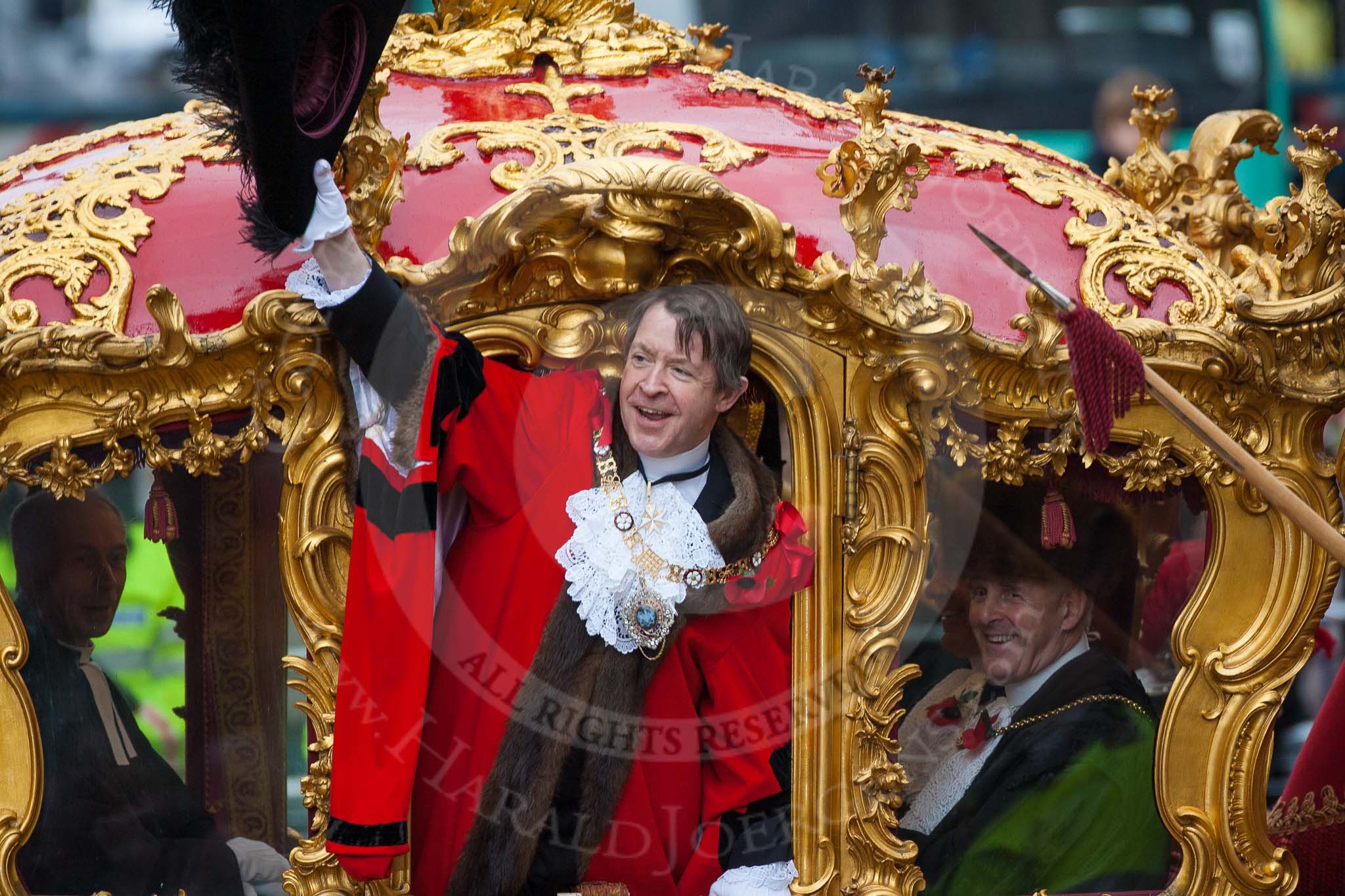 Lord Mayor's Show 2012: Lord Mayor Roger Gifford waving from his carriage as he is about to leave for St Paul's Cathedral..
Press stand opposite Mansion House, City of London,
London,
Greater London,
United Kingdom,
on 10 November 2012 at 12:12, image #1951