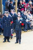 Lord Mayor's Show 2012: A Royal Navy Commander and a Lieutenant acting as Marshalls at the event..
Press stand opposite Mansion House, City of London,
London,
Greater London,
United Kingdom,
on 10 November 2012 at 10:45, image #111