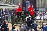 Lord Mayor's Show 2012: Entry 142 - Late Lord Mayor, Alderman and Mrs David Wootton, with the Chaplain Andrew Walker, escorted by four Yeoman Warders and cadets of 1475 (Dulwich) Squadron. Two Dogget's Coat and Badge men stand on the rear of the carriage..
Press stand opposite Mansion House, City of London,
London,
Greater London,
United Kingdom,
on 10 November 2012 at 12:07, image #1901