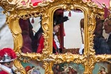 Lord Mayor's Show 2012: The new Lord Mayor, Roger Gifford, on his left the Chaplin, opposite the Sergeant of Arms and the Sword Bearer, Col. Richard Martin, in the State Coach, leaving for St Paul's Cathedral..
Press stand opposite Mansion House, City of London,
London,
Greater London,
United Kingdom,
on 10 November 2012 at 12:12, image #1944