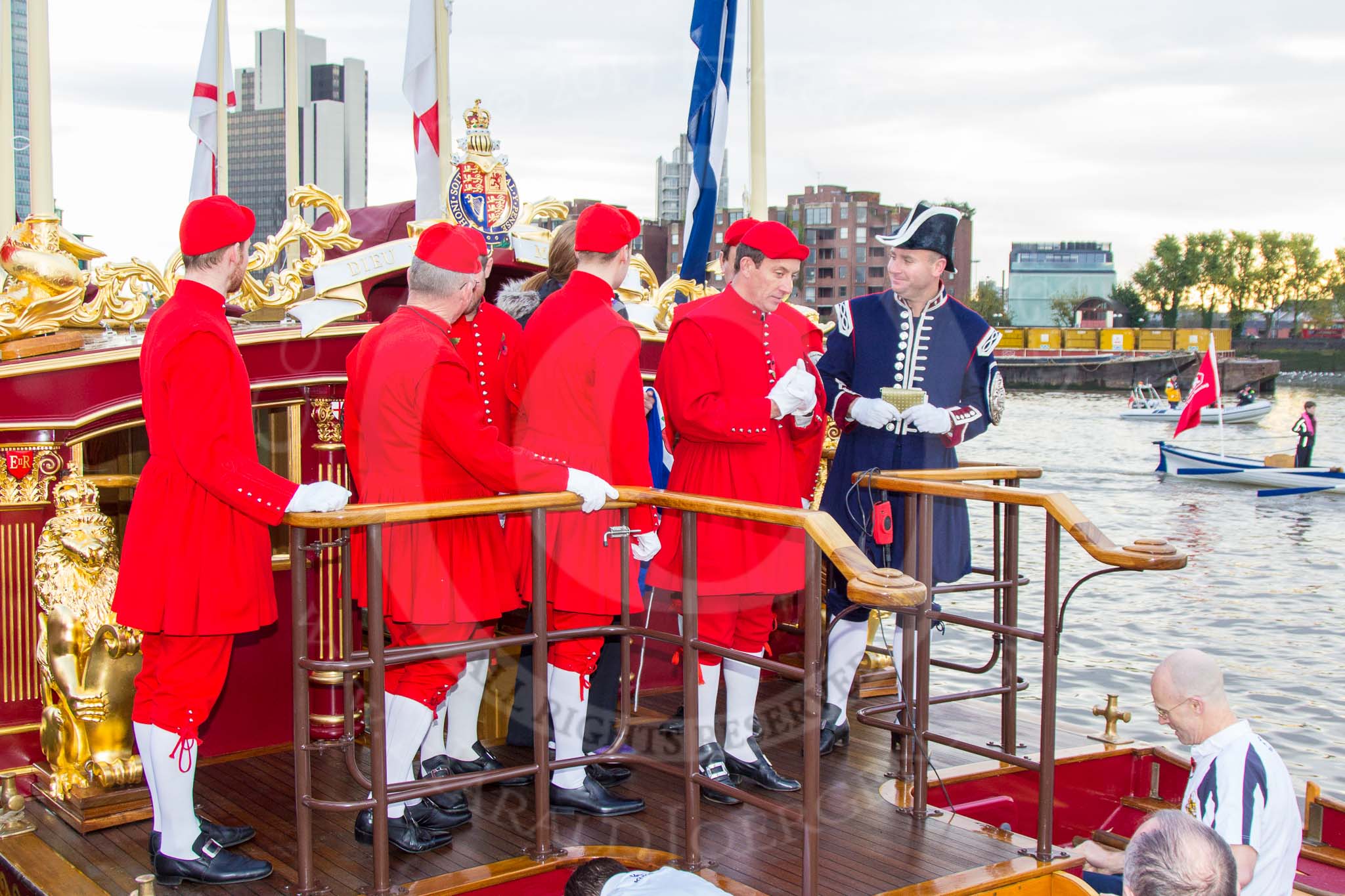 Lord Mayor's Show 2013: Thames Watermen on board of Gloriana, the barge built for The Queen's Diamond Jubilee, getting ready to row the Lord Mayor from Westminster to the City. Photo by Mike Garland..




on 09 November 2013 at 08:18, image #2
