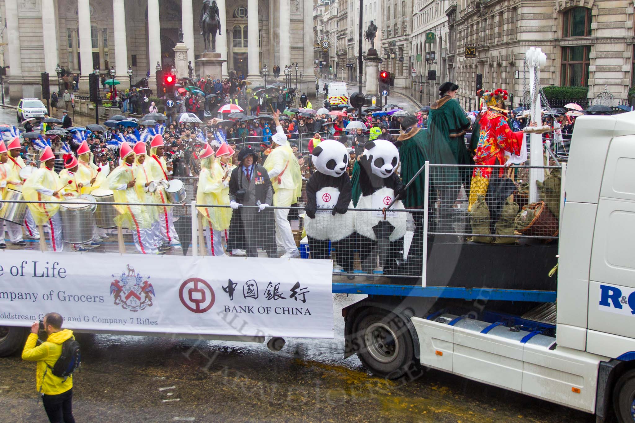 Lord Mayor's Show 2013: 6-Worshipful Company of Grocers- The Spice of Life, represented by the Coldstream Guards, G Company 7th Rifles and participants from Oundle School and Mossbourne Academy..
Press stand opposite Mansion House, City of London,
London,
Greater London,
United Kingdom,
on 09 November 2013 at 11:02, image #173